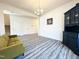 Bright living room featuring modern floors, a sofa, and stylish decor at 5 Misty Grove Trl, Franklinton, NC 27525