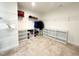 A large walk in closet with carpet and shelving for clothing and accessories at 5 Misty Grove Trl, Franklinton, NC 27525