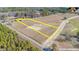 Aerial view of land tract with trees and a road, lot line estimations included at 515 Sanctuary Trl, Cameron, NC 28326