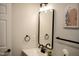 Contemporary bathroom featuring matte black fixtures and a new vanity at 5845 Farmwell Road Rd, Raleigh, NC 27610