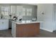 Bright kitchen with stylish island and new appliances, perfect for cooking at 5845 Farmwell Road Rd, Raleigh, NC 27610