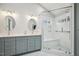 Bright bathroom with double sinks, quartz countertop, glass shower, and modern fixtures at 6108 King Croydon Ct, Raleigh, NC 27603