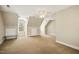 An expansive bedroom with dormer windows, neutral tones, a ceiling fan and plush carpeting at 6108 King Croydon Ct, Raleigh, NC 27603