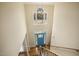 Bright foyer with a blue entry door, chandelier, and hardwood floors seen from the upper floor at 6108 King Croydon Ct, Raleigh, NC 27603