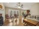 Spacious living room with hardwood flooring, fireplace, and ample natural light and comfortable furnishings at 6108 King Croydon Ct, Raleigh, NC 27603