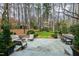 Spacious backyard features multiple seating areas for dining and relaxation at 620 Marlowe Rd, Raleigh, NC 27609
