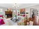 Spacious living room featuring a fireplace, artwork and elegant decor at 620 Marlowe Rd, Raleigh, NC 27609