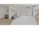 Serene main bedroom with a cozy seating area, neutral carpeting, and lots of natural light at 620 Marlowe Rd, Raleigh, NC 27609