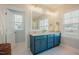 A spacious bathroom with double sinks and plenty of natural light at 65 Walking Trl, Youngsville, NC 27596
