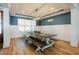 Inviting dining room featuring a wooden table with bench seating and stylish lighting at 65 Walking Trl, Youngsville, NC 27596