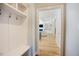 Welcoming entryway with mudroom style bench and hooks, leading into living area at 65 Walking Trl, Youngsville, NC 27596