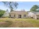Home exterior with a sliding glass door, and small patio in the backyard at 7 Windsor Glen Dr, Durham, NC 27703