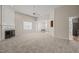 Spacious living room with fireplace, neutral color palette, and open floor plan at 7 Windsor Glen Dr, Durham, NC 27703