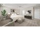Spacious main bedroom featuring tray ceilings, plush carpet, and a serene atmosphere at 7 Windsor Glen Dr, Durham, NC 27703