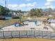 Community playground with slides, climbing structures, and benches at 7 Windsor Glen Dr, Durham, NC 27703