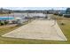 Community volleyball court with a picturesque view of the lake at 7 Windsor Glen Dr, Durham, NC 27703