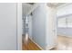 Freshly painted bedroom with wood flooring, white trim and one window at 709 Fitzgerald Dr, Raleigh, NC 27610