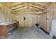 Spacious shed interior with workbench and ample storage space, perfect for projects and organization at 709 Fitzgerald Dr, Raleigh, NC 27610