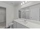 Clean bathroom featuring a modern vanity with white countertop and cabinetry, plus a separate shower at 801 Berkeley Glen Rd, Zebulon, NC 27597