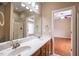 Bathroom with double sink vanity, large mirror, shower and toilet at 804 Long Meadows Rd, Chapel Hill, NC 27516