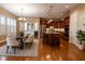 Open kitchen with a center island, stainless steel appliances, and a dining area at 804 Long Meadows Rd, Chapel Hill, NC 27516