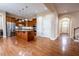 Beautiful kitchen with stainless steel appliances, granite countertops, and a large center island at 804 Long Meadows Rd, Chapel Hill, NC 27516