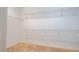 Spacious walk-in closet with wire shelving and carpeted floor at 804 Long Meadows Rd, Chapel Hill, NC 27516