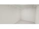 Empty walk in closet with shelves and neutral paint at 81 St Andrews Dr, Zebulon, NC 27597