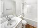 This bathroom features a tub and shower combo, and a vanity with a sink at 8425 Fawncrest Dr, Raleigh, NC 27603