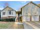Charming two-story home with a two-car garage and well-manicured landscaping at 8425 Fawncrest Dr, Raleigh, NC 27603