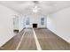 Spacious living room with plush carpeting, fireplace, and plenty of natural light at 8425 Fawncrest Dr, Raleigh, NC 27603
