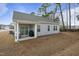 Backyard featuring a covered patio perfect for outdoor entertaining at 88 Molly Mac Ln, Angier, NC 27501