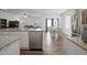 Bright, open kitchen featuring stainless steel appliances and granite countertops at 88 Molly Mac Ln, Angier, NC 27501