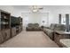 Bright living room with plush seating, modern entertainment center, and neutral decor at 88 Molly Mac Ln, Angier, NC 27501