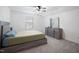 Comfortable main bedroom with dresser and ceiling fan at 88 Molly Mac Ln, Angier, NC 27501