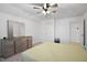 Spacious main bedroom featuring dresser and ceiling fan at 88 Molly Mac Ln, Angier, NC 27501