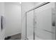 Modern shower with clear glass enclosure, offering a clean and spacious design at 88 Molly Mac Ln, Angier, NC 27501