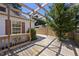 A spacious backyard deck features a pergola with natural sunlight. A great outdoor entertaining space at 905 N Hyde Park Ave, Durham, NC 27701