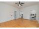 Main bedroom featuring hardwood floors and access to a closet and bathroom at 905 N Hyde Park Ave, Durham, NC 27701