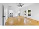 Main bedroom featuring hardwood floors and access to two walk-in closets at 905 N Hyde Park Ave, Durham, NC 27701