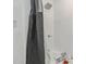 Modern shower with a gray shower curtain and a chrome shower head at 905 N Hyde Park Ave, Durham, NC 27701