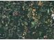 Aerial view showing property at 9115 NC-157 and surrounding landscape at 9115 Nc 157, Rougemont, NC 27572