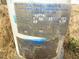 View of the well data plate, including the depth and static water level at 9115 Nc 157, Rougemont, NC 27572