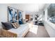 Versatile basement bedroom with daybed, exercise equipment, and natural light at 1004 Kings Mill Rd, Chapel Hill, NC 27517