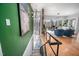 Bright stairway with large windows providing natural light and a view of the surrounding landscape at 1004 Kings Mill Rd, Chapel Hill, NC 27517