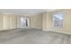 Bright bedroom features plush carpet and natural light from a large window at 104 Red Bark Ct, Apex, NC 27539