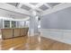 Spacious living room featuring hardwood floors, neutral walls, and an open layout at 104 Red Bark Ct, Apex, NC 27539