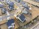 Aerial view of a new house showing the screened porch and community layout at 104 Sage Oak Ln, Holly Springs, NC 27540