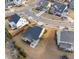 Aerial view of a beautiful house featuring landscaping and community neighborhood at 104 Sage Oak Ln, Holly Springs, NC 27540