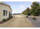 Spacious backyard with a screened-in porch, perfect for outdoor living and entertaining at 104 Sage Oak Ln, Holly Springs, NC 27540